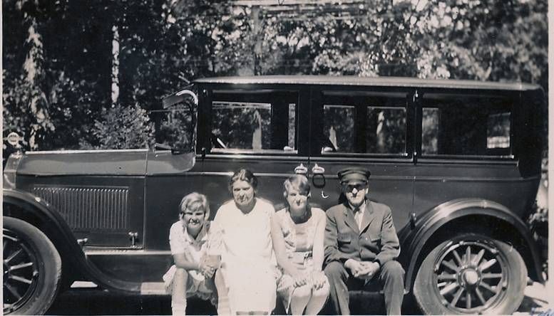 Alfred Braun, shown at right, chauffeured for the Rumseys around 1910, residing in the second floor apartment of the carriage house. At that time he met his future wife, Gerda Petersen (second from left), who worked in the Rumsey household. Image courtesy of Paula Berghorn Polito.