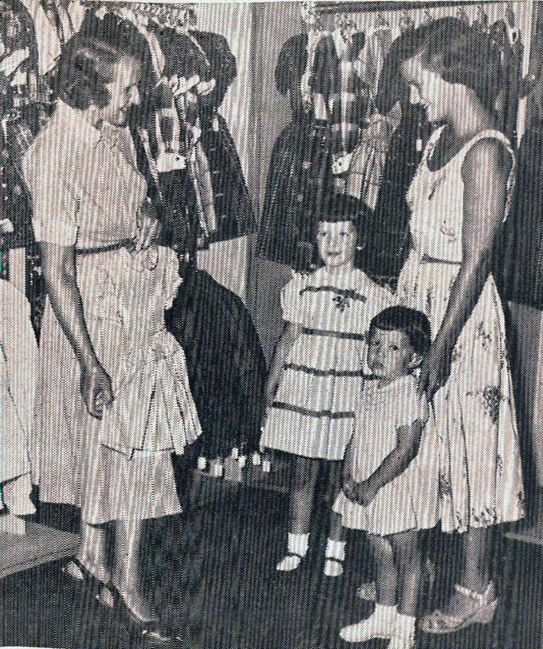 Frances Hansen with Mrs. R. E. Griffis and daughters Linda (6) and Gayle (3), 1955.