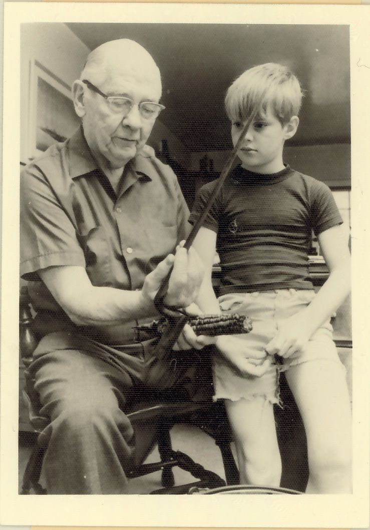 Elmer Vliet shows young historian John Bailey the intricacies of a Revolutionary War period weapon, c. 1970.