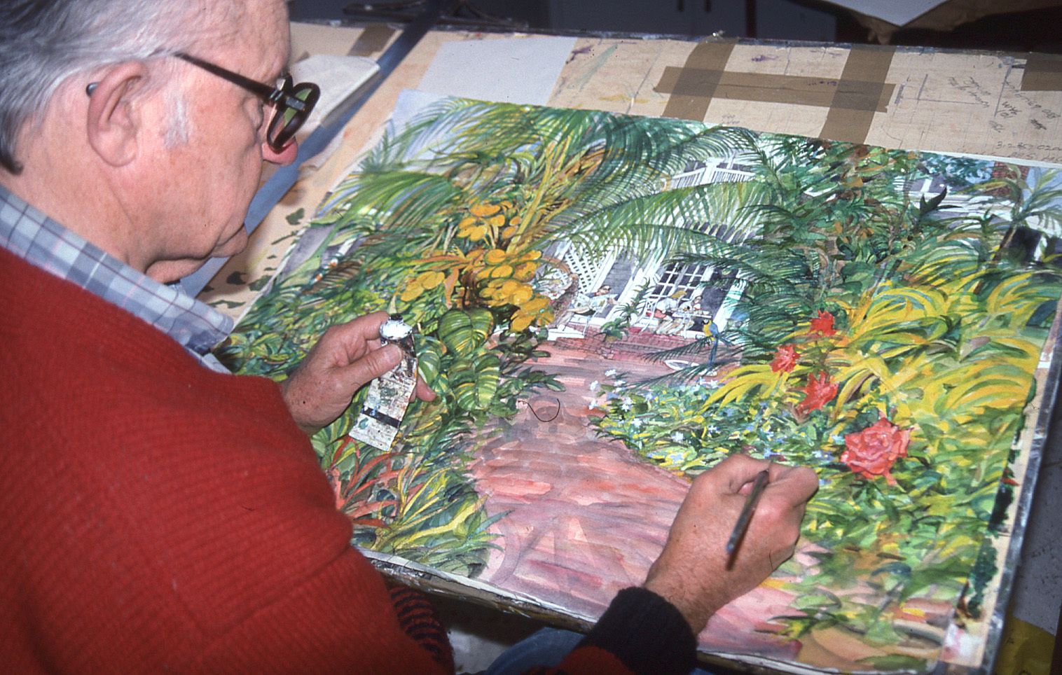 Franklin McMahon at his studio putting the finishing touches on a painting of Ernest Hemingway’s home in Key West, Florida. Image courtesy of Mark and Carolyn McMahon.
